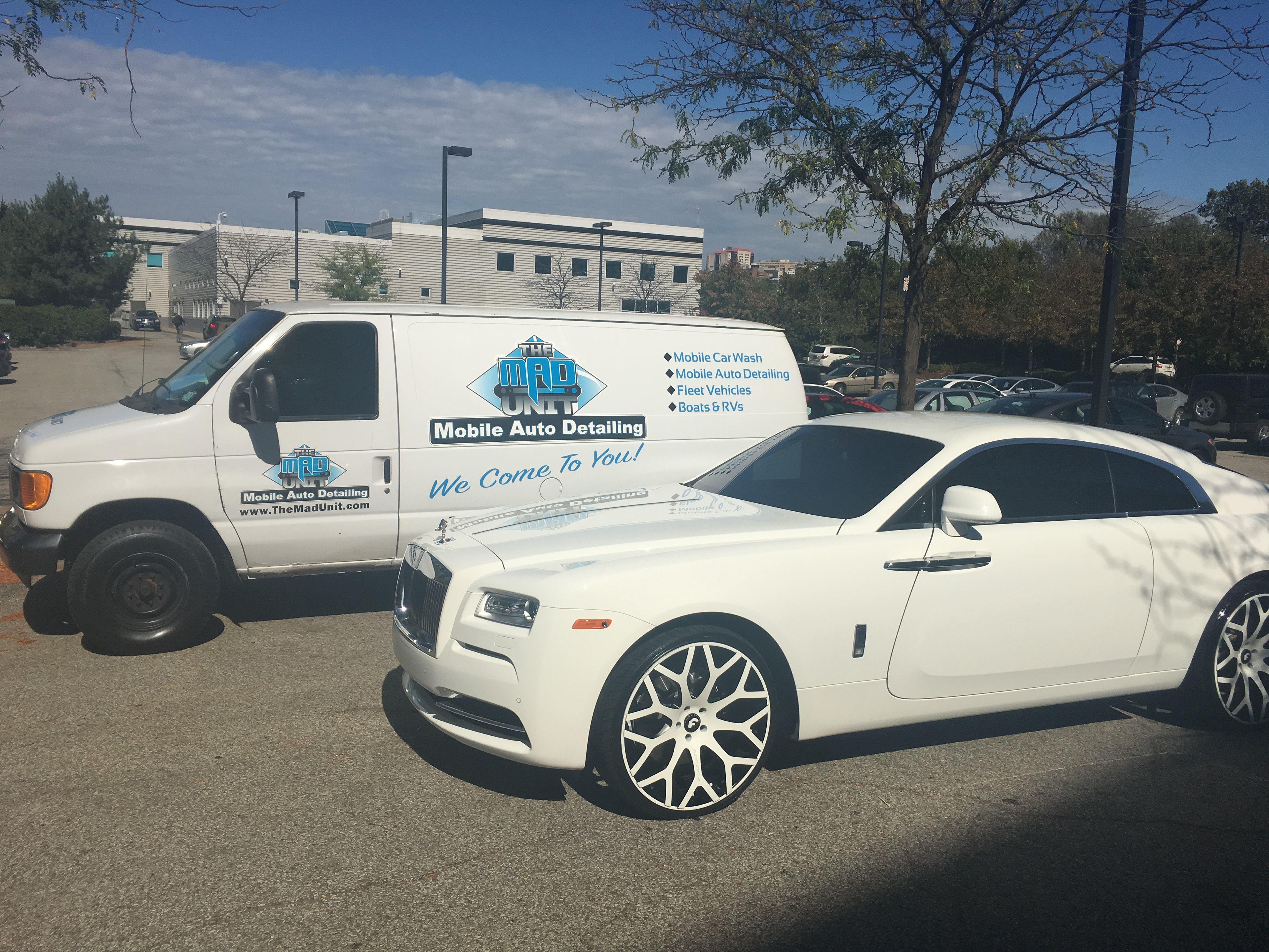 White Rolls-Royce with MAD Unit mobile detailing van